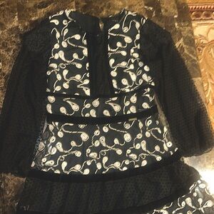 Very gorgeous dress brand new a never worn with and black color with some unique